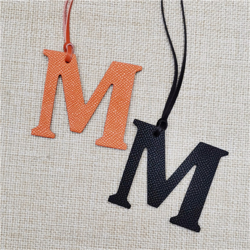XMESSUN Nieuwe Engelse letters - Monogram Keychain Leather recensie en prijs